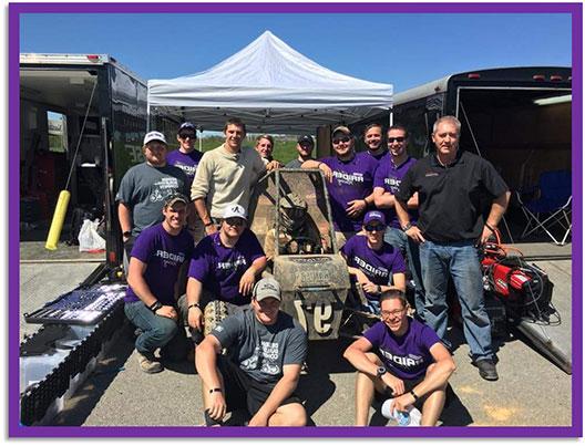 Mount Union's BAJA Racing Team posing around car